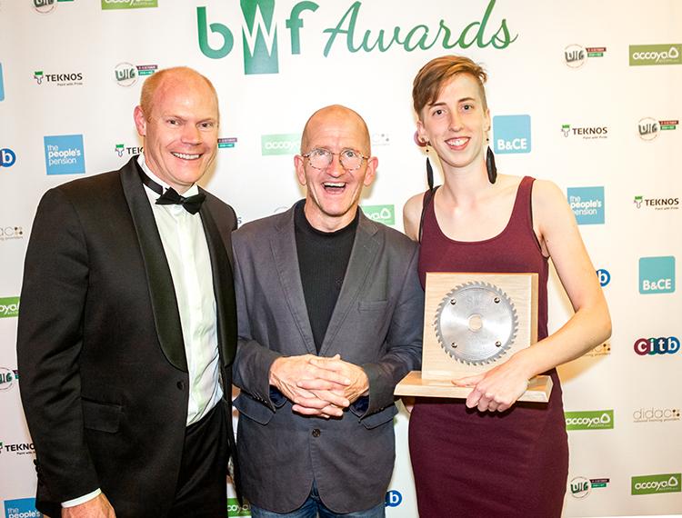 Imogen Davies, BWF Joinery Apprentice of the Year with employer Mark Laws and awards host Olympian Eddie ‘The Eagle’ Edwards.