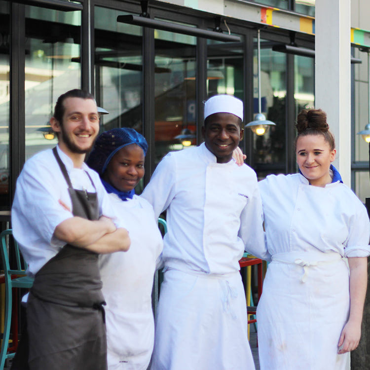 Finalists stand with Head Chef, Giovann