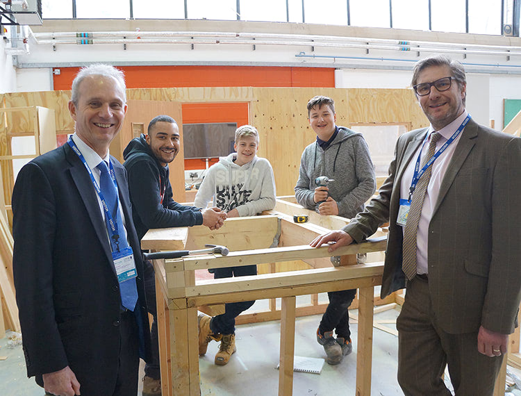 The Leader of the House of Commons David Lidington at CRC with Cambridge mayoral candidate James Palmer and carpentry apprentices Ashley Bowyer-Musukutwa, Josh Cruci and Jonathan Jenkins