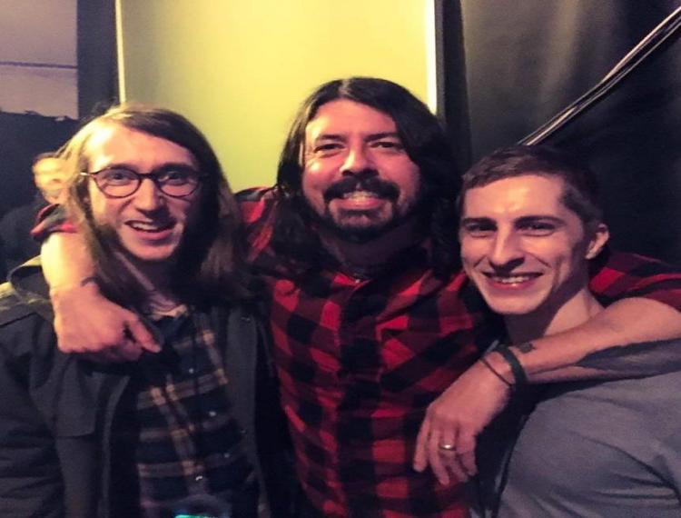 Phil (left) with Foo Fighters frontman, Dave Grohl (middle) and Phil Armstead (right)