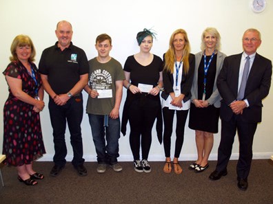 Apprentices Scott Westgarth and Nicole Lonsdale (centre) received grants from Iver United Charities to buy equipment for their work, presented by the charity's treasurer Rob Penn (far right). Also attending (left-right) were Uxbridge College's Bernadette Keating, Tony Pool, Kirsty Lawson and Jo Withers.