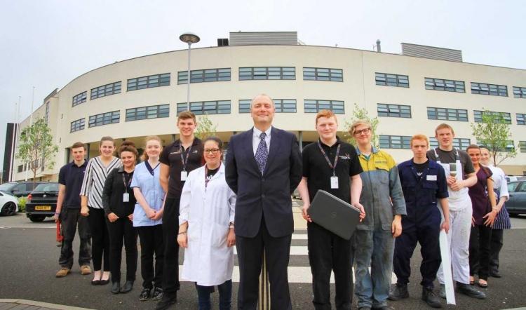 Darren Hankey with a selection of apprentices from departments across Hartlepool College