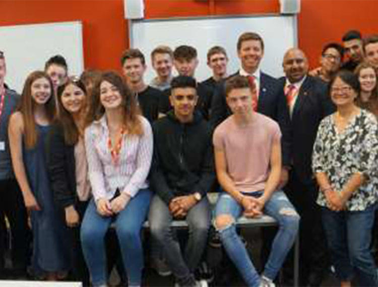 Business students with Robert Davey and Mik Kaler from Metro Bank