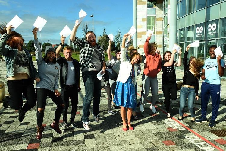 Middlesbrough College A Level students celebrate their success with College principal Zoe Lewis (Centre)