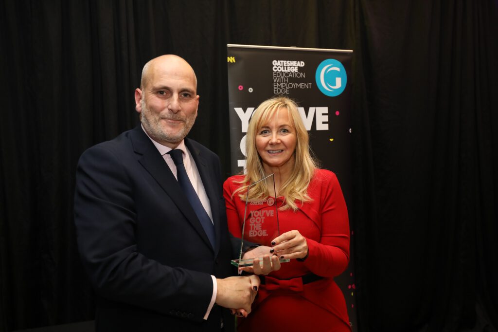 Brewin Dolphin’s Robert Irving receives the Large Employer of the Year Award from Judith Doyle of Gateshead College