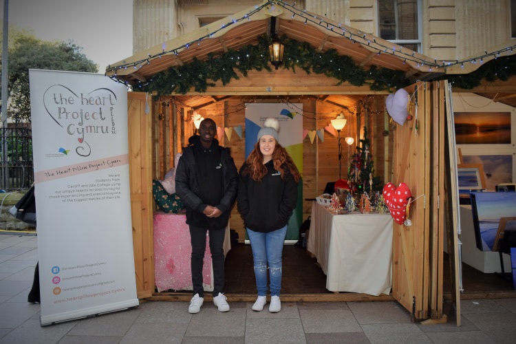 (l-r): Jed Smith and Mackenzie Webber at the CAVC stall at the Cardiff Christmas market