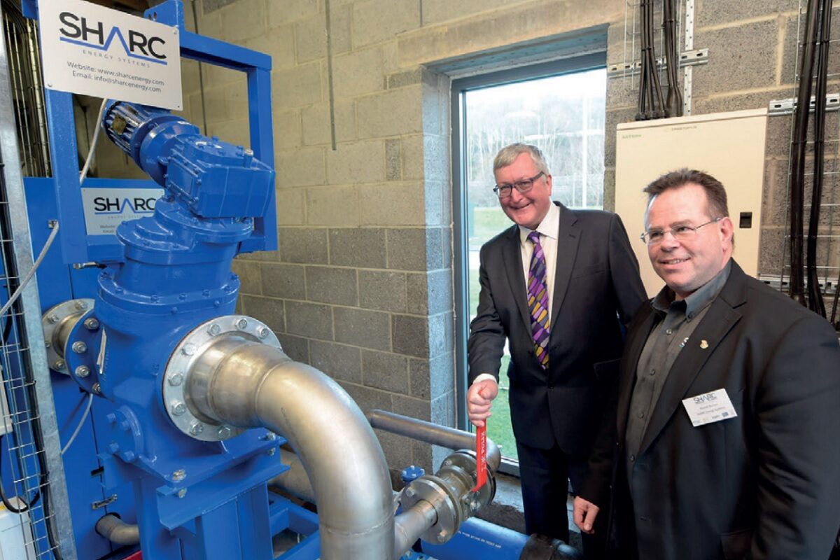 Fergus Ewing MSP, Minister for Business, Energy and Tourism, and Russ Burton, Chief Operating Offi cer of International waste water Systems (owners of Sharc Energy Systems) in the Energy Centre at Borders College