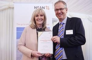 David Vineall receives the certificate of thanks from Jo Tipa, of NSAN