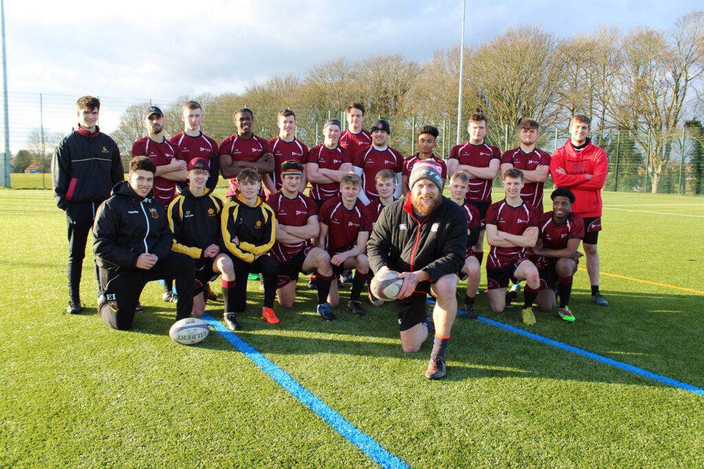Tresham Rugby Academy students with Russell Earnshaw (foreground)