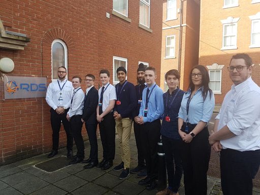 Seven of the RDS Global Technology Employer Academy students with company representatives Danny Chaplin, Charlotte Gray and Mark Watson.