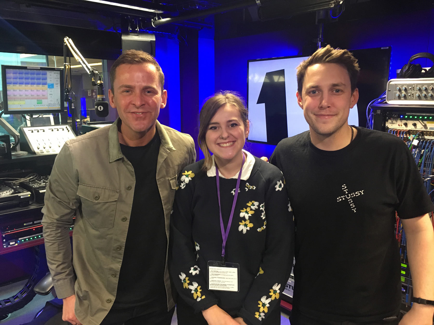 Alice in the BBC Radio 1 studio with DJs Scott Mills (left) and Chris Stark.