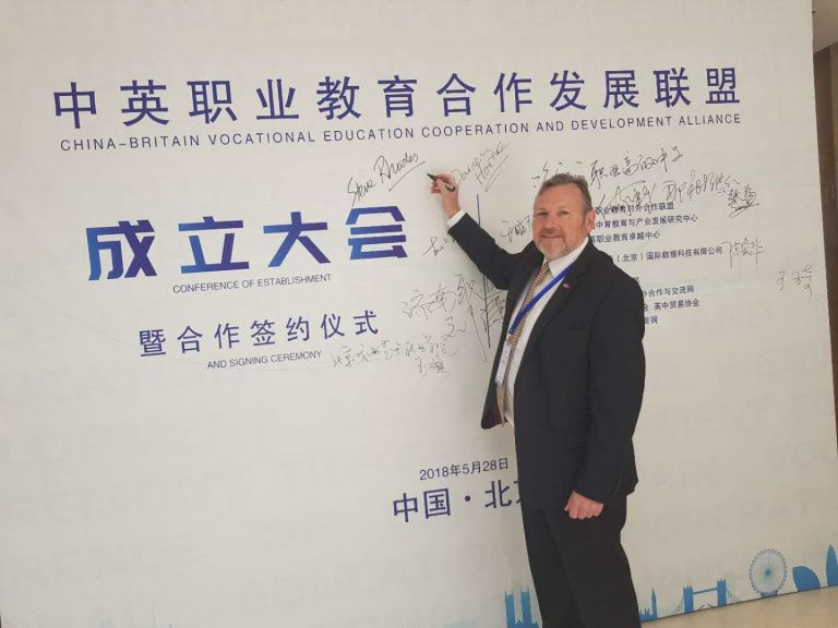 Steve Rhodes, Assistant Principal for Worldwide Operations at NPTC Group of Colleges is pictured at the inaugural meeting and signing of the China-Britain Vocational Education Cooperation and Development Alliance in China.