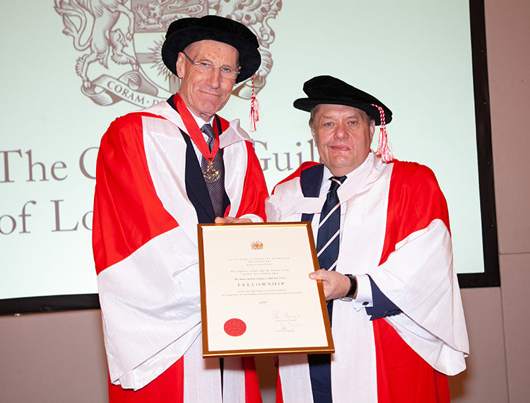 The Rt Hon John Hayes CBE MP, being granted a fellowship of the City and Guilds London Institute