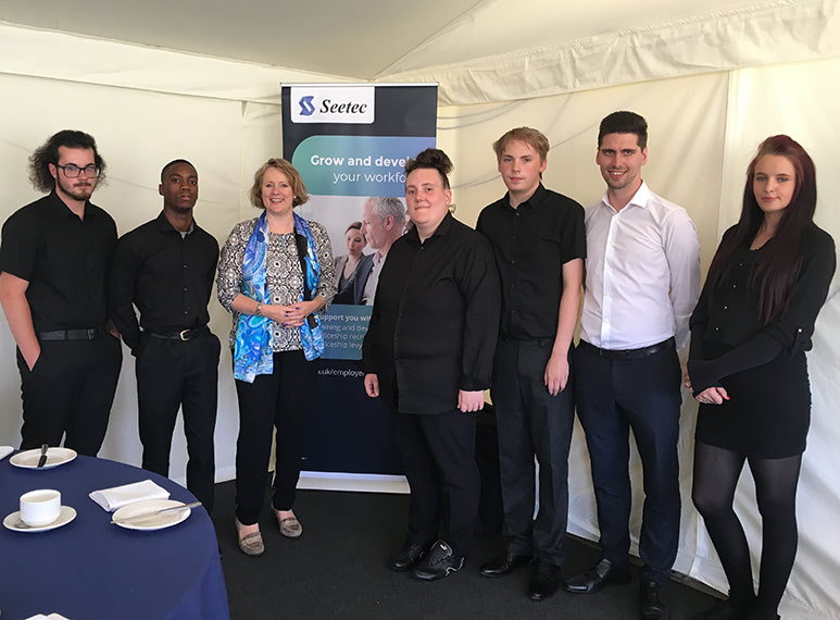 Chelmsford MP Vicky Ford (third left) and Seetec Skills Co-ordinator Chris Levitt (second right) with the trainees at the Skills Showcase