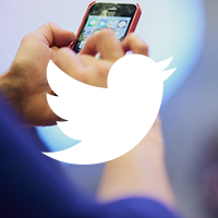 Mobile phone with white Twitter bird overlay ©Jisc and Matt Lincoln - overlay: Twitter