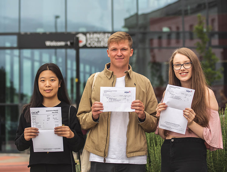 Students at Barnsley Sixth Form College celebrate their A Level results. [L-R: Rong Chen, Nathan Phipp-Macintrye and Charlotte Martin] Photography by awesome. © We Are Awesome Ltd 2018