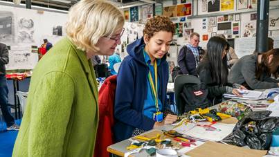 Ofsted Chief Inspector Amanda Spielman talking to a fashion student on a visit to Barking & Dagenham College