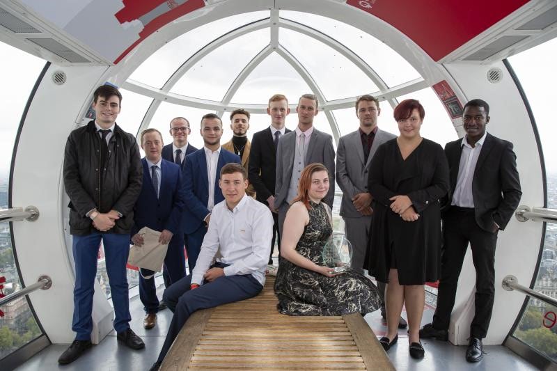 Josh Smith, seated front row, left, with fellow finalists of the Youthbuild UK Awards, on the London Eye
