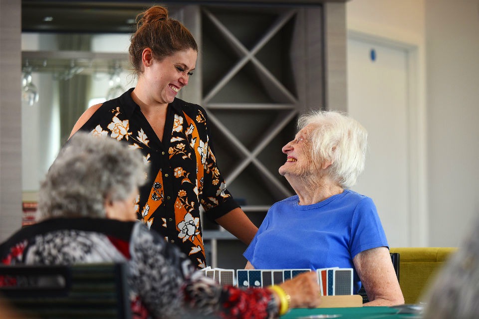 ExtraCare Wellbeing Advisor chats with a resident