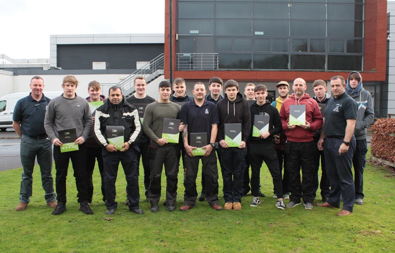 Introduction to Plumbing students pictured with lecturer Alan Reid (far left) and Alan Marshall of Jamestown Metals/Associated Lead Mills Ltd (far right)