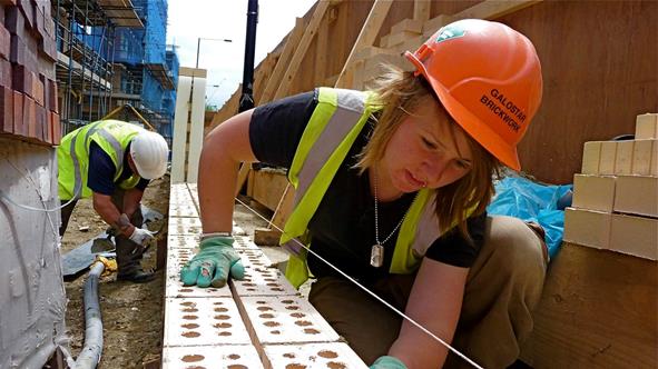 Kerri Chambers during her early career as a Student Bricklayer in East London.