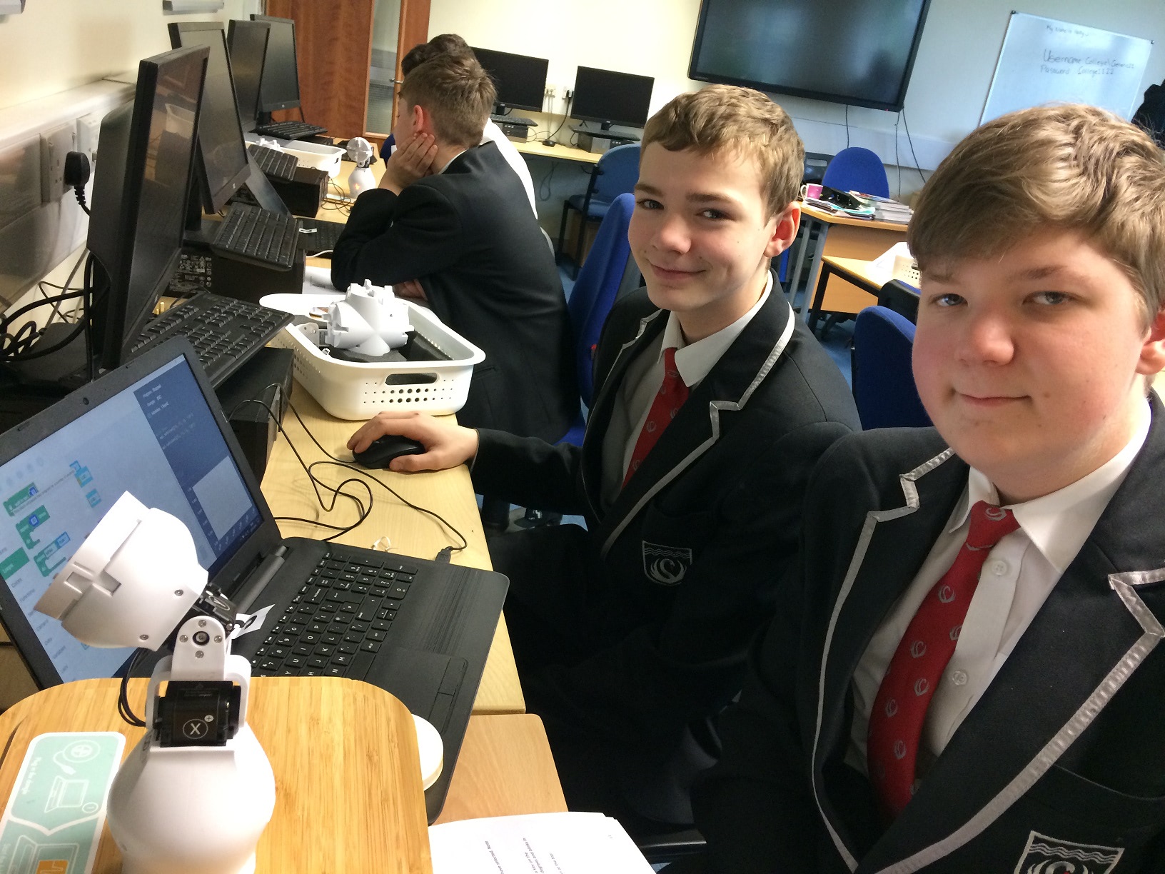 wo pupils from Kirk Hallam Community Academy are pictured programming Fable robots
