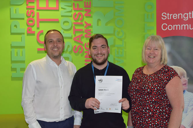 Leon Horn (centre) with Ryan Coles, Contact Centre Experience Manager at Plymouth Community Homes, and Angie Edwards-Jones, Head of Customer Experience at Plymouth Community Homes