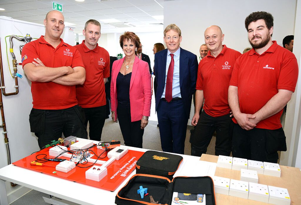 Qualified plumbers and gas apprentices Tom Down and Tim Moncur, Minister for Apprentices and Skills Anne Milton, Richard Harpin, HomeServe founder and founder of youth enterprise charity The Enterprise Trust, gas apprentices Leigh Denahy and Dale McGann.
