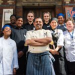 Students from West London College and Westminster Kingsway College with Chef Cyrus Todiwala.