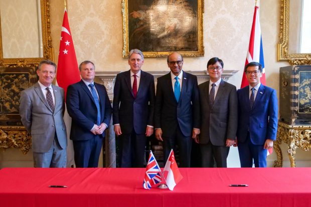 Kevin at the signing of a memorandum of understanding between the UK and Singapore governments