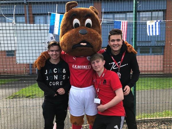 Left to right - Barnsley College students Ronan Bridger, James Hulse and Dillon Thorpe with Toby Tyke.