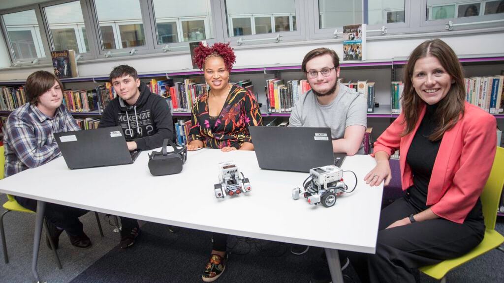 Photo caption: Education Minister Michelle Donelan (right) meets with digital tech students from Gateshead College