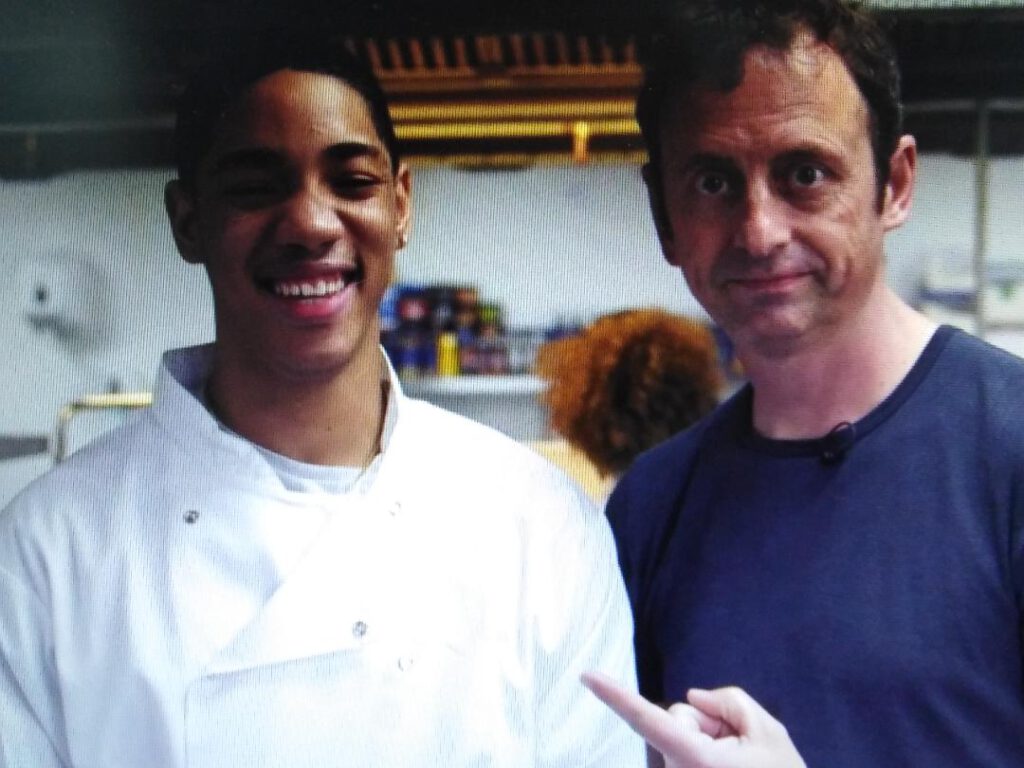 Photo caption: Culinary Sklills student Teo with BBCThe One Show presenter Matt Allwright.