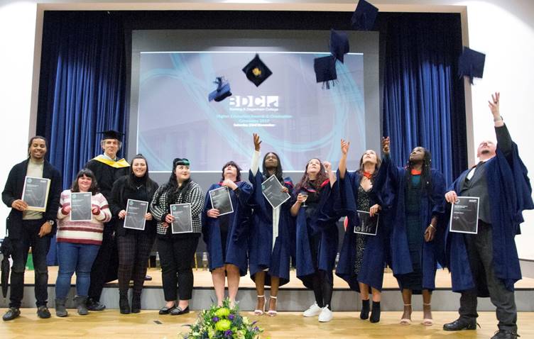 A group of Barking & Dagenham College photography graduates 2019 celebrating IMAGE COURTESY OF PETER H.EVANS