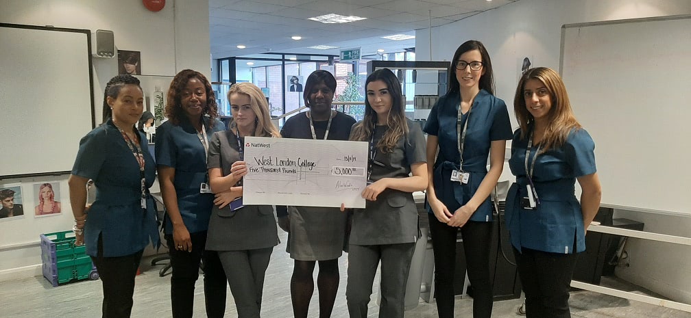 Photo Caption: Hairdressing and Beauty Therapy Students Receiving their £5000 Bursary from VTCT