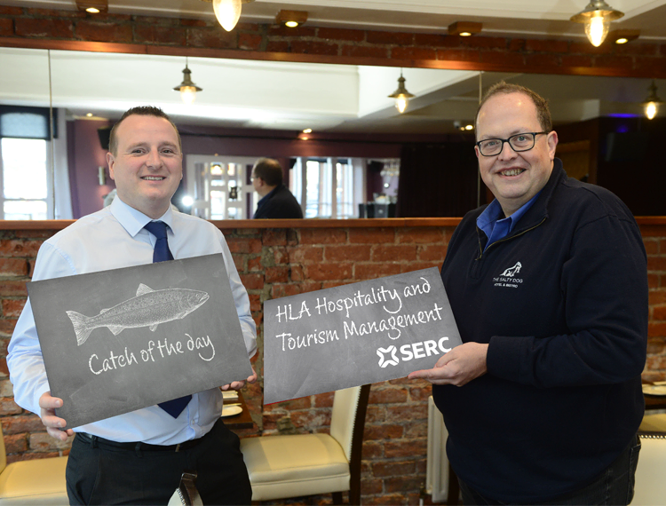 Paul Mercer, Deputy Head of Hospitality, Management, Tourism and Languages at South Eastern Regional College (SERC) and Ken Sharp, owner of The Salty Dog Hotel and Bistro and The Boathouse in Bangor announce the launch of two new Higher Level Apprenticeship programmes in Hospitality and Tourism Management with Specialism at SERC.
