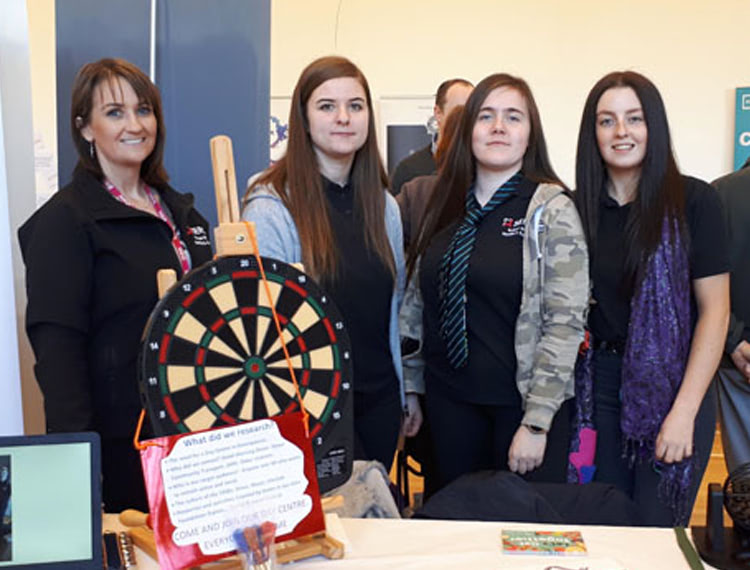 Pictured at their stall during the event (L-R), Rosemary Peters (Lecturer), with Tia Moore, Victoria Gettings and Mia Angell who are currently studying Btec Level 3 National Foundation Diploma in Health and Social Care.