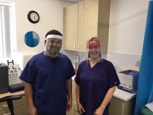 Pictured are two doctors from Brereton Surgery which is just one of the many GP surgeries to benefit from The Hart School's visor production.