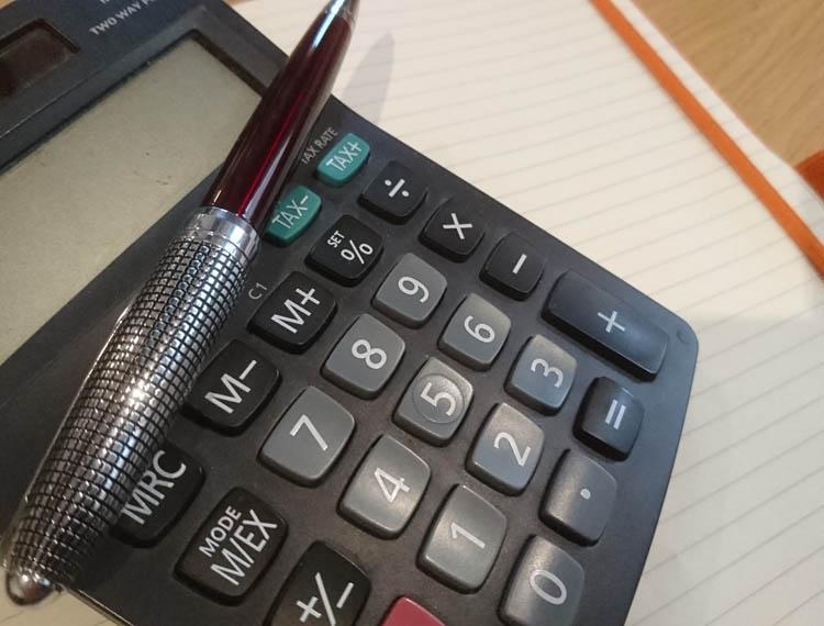 Calculator, pad and pen