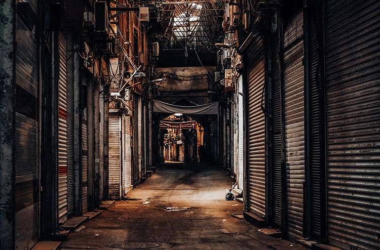 Shuttered up street that looks a bit rundown