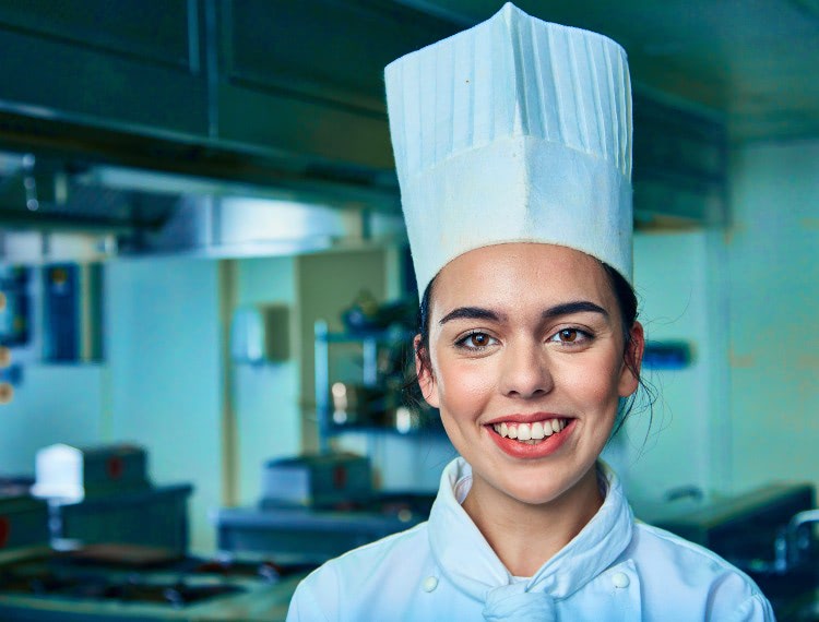 Chef with her hat on