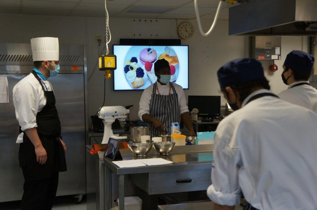 Catering students learn from patisserie expert