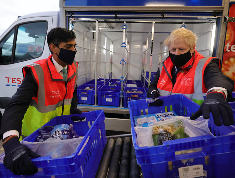 Rishi and Boris picking and packing for Tesco