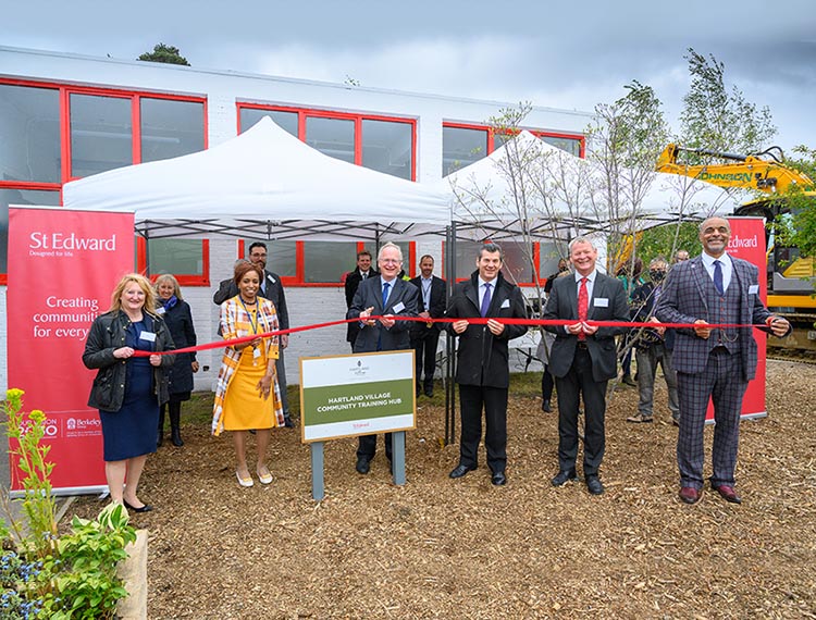 Principal Anthony Bravo, St Edward and other partners officially opening the Hartland Village Training Centre by cutting the red ribbon.