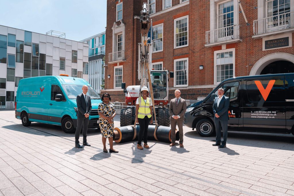 people standing with vehicles outside