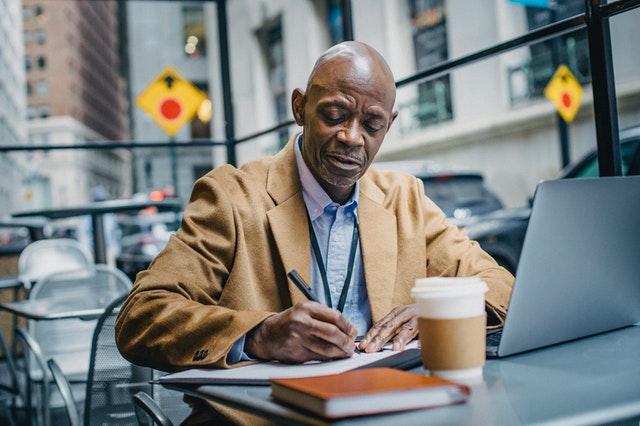 man working flexibly outside