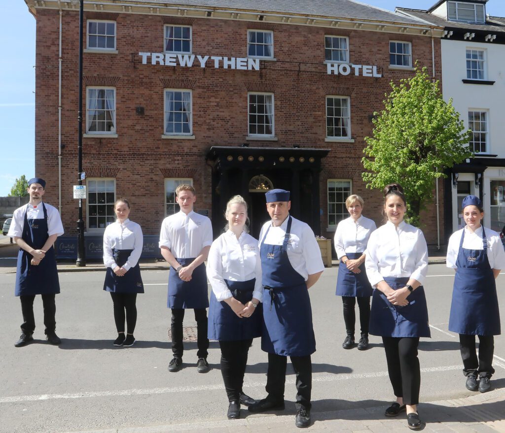 Jo and Nick Davies (centre) with their staff outside Chartists 1770 at The Trewythen.