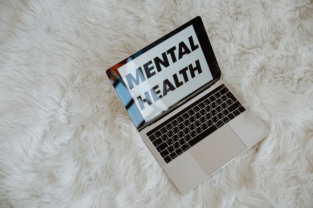 'mental health' written on a laptop screen