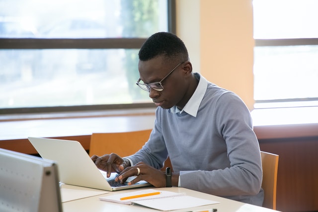 Student working on their laptop