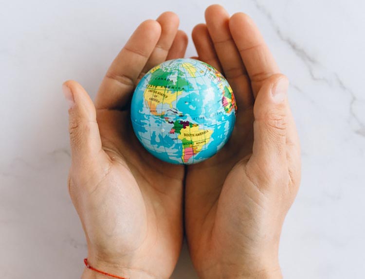 Globe in someone's hands